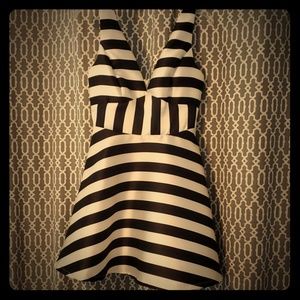 Black and white striped silk dress.